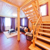 Wooden staircase to the second floor of a country house