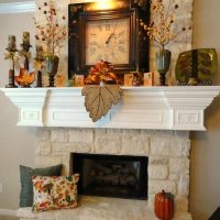 Autumn fireplace decor in the living room of a private house