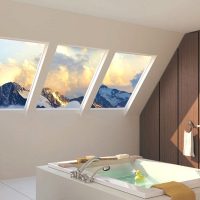 Bagno di design nel sottotetto di una casa di campagna