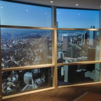 Panoramic window with wooden frame.