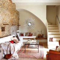 Spanish living room with stairs to the second floor of a private house