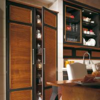 Wooden cabinet in the interior of the kitchen