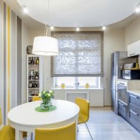 Yellow chairs at the white dining table