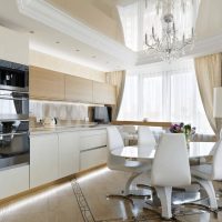 Crystal chandelier on the ceiling of the kitchen