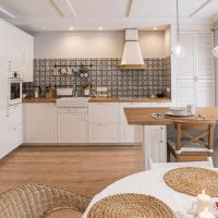 Wood in the interior of a spacious kitchen-living room