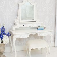 White bent-leg dressing table