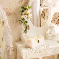 Vase with flowers on the dressing table in the bedroom