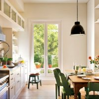 Linear kitchen with dining table