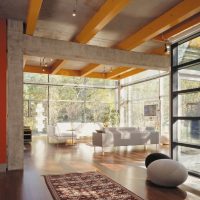 Concrete beams on the ceiling of the living room of a private house