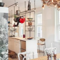 Chandelier made of branches on the kitchen ceiling