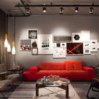 Red sofa in a gray living room