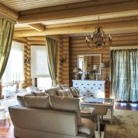 Curtains in the interior of the log house