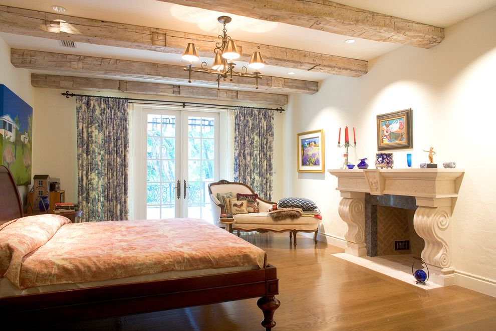 Bedroom interior with fireplace in a country house