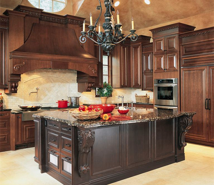 Chandelier with candlesticks over the kitchen island