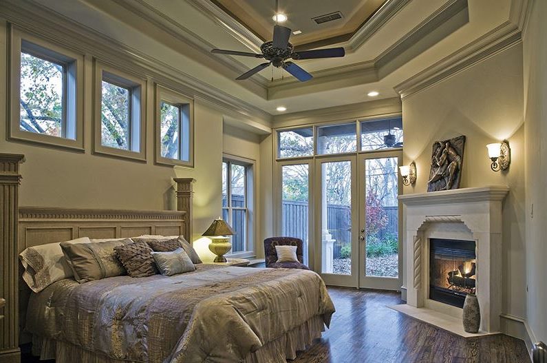 Lamps above the fireplace in the antique bedroom