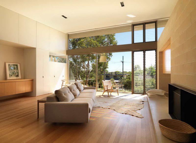 Beige living room interior with panoramic window