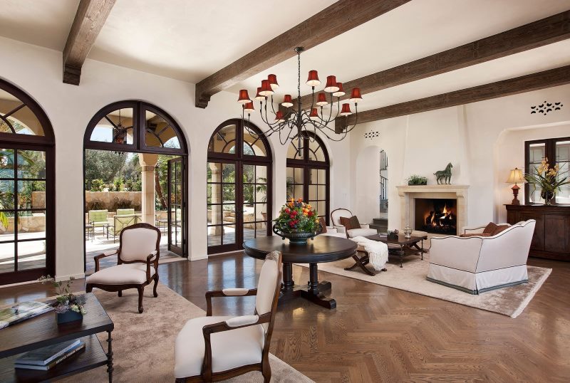 Wooden brown beams on a white ceiling