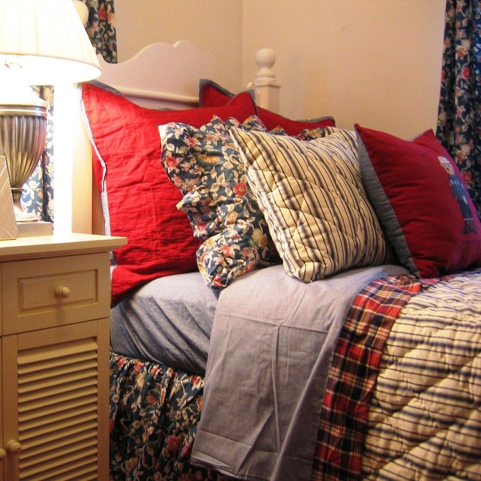 Multi-colored pillows on the bed in the bedroom