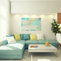 Turquoise sofa di ruang tamu putih