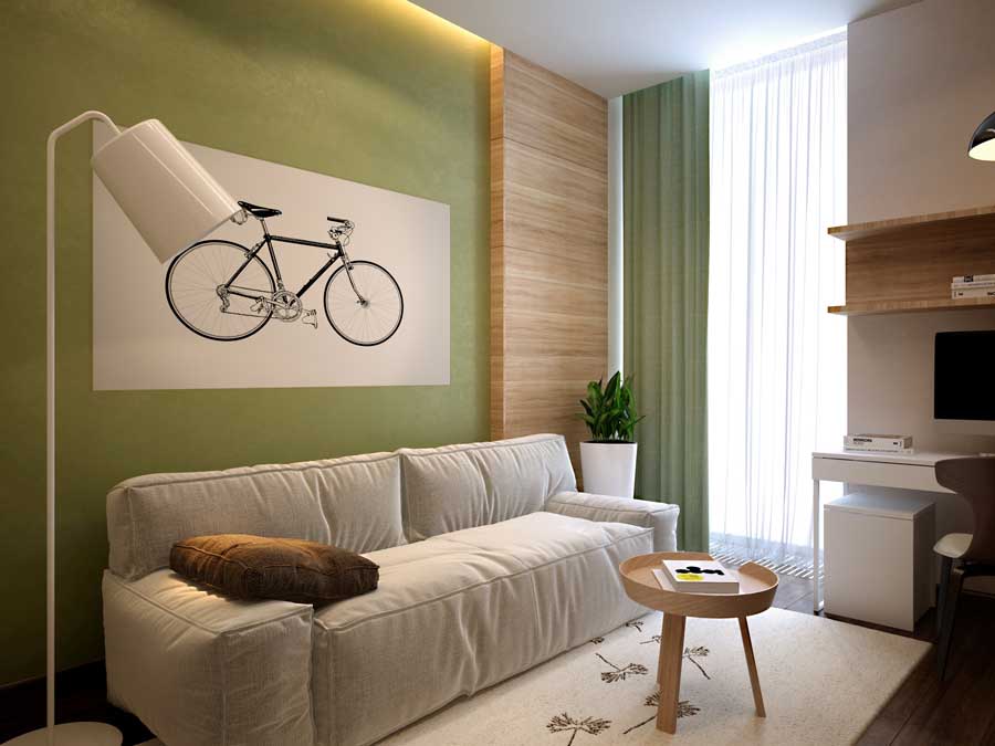 Painting with a bicycle on the green wall of the living room