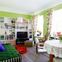 White ceiling in the living room of a city apartment