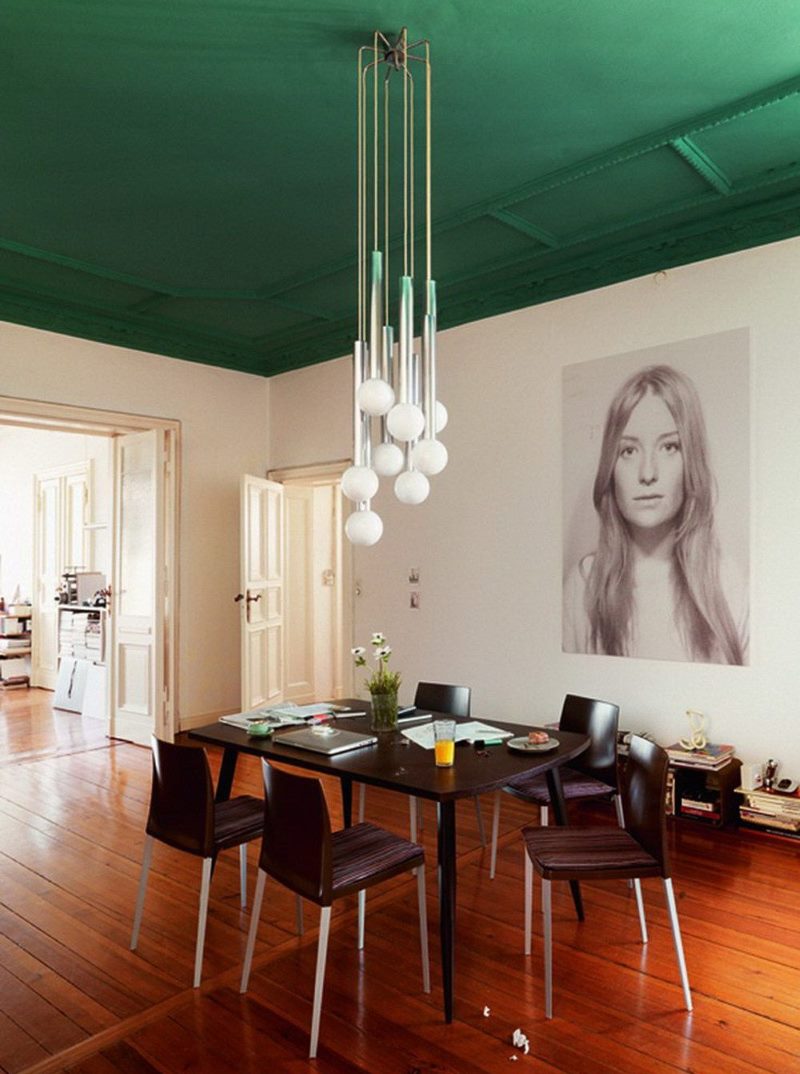 Green ceiling in the interior of the dining room of a private house