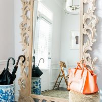 Mirror in a wooden frame with carved patterns