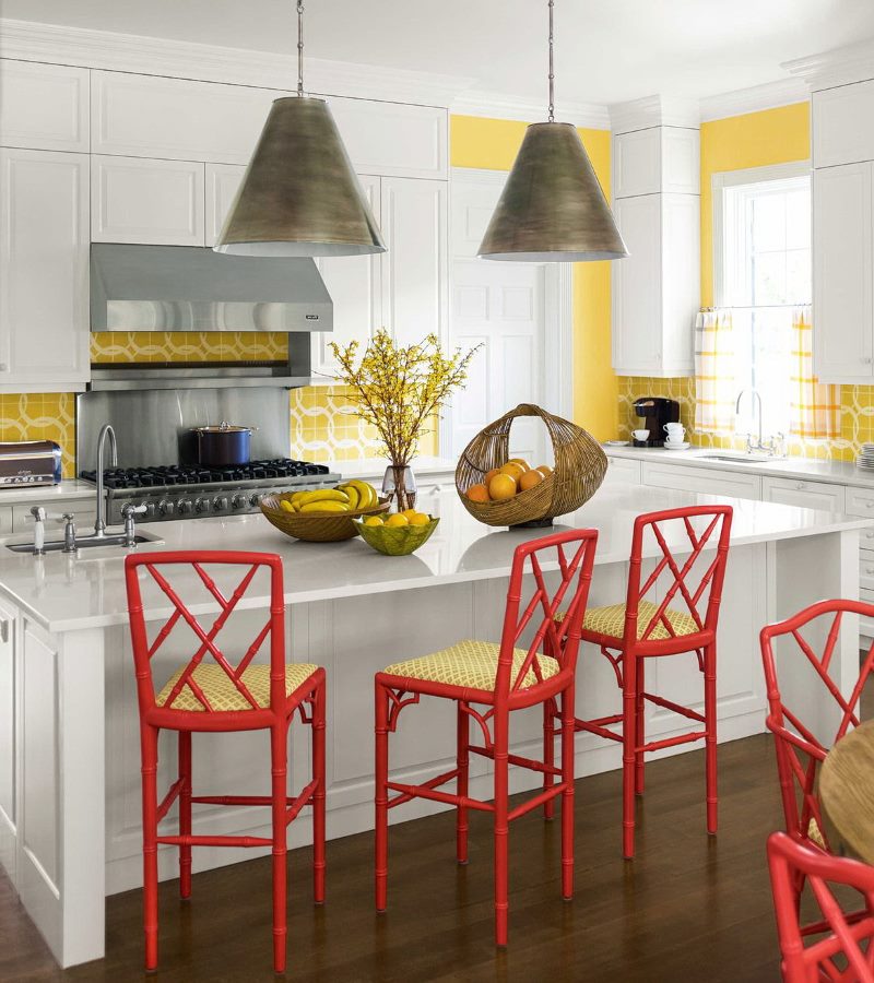 Red bar stools in the design of the kitchen