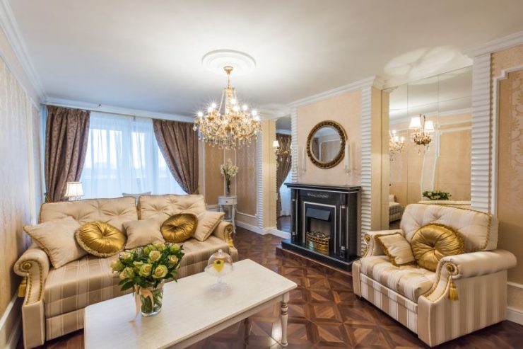 Living room with parquet and fireplace with black trim