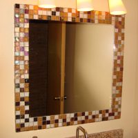 Mosaic tiles on the mirror frame