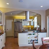 Design of a kitchen-living room with a door to the garden of a private house