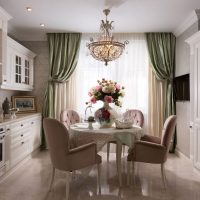 Round dining table in the center of the kitchen