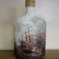 Frigate drawing on a glass bottle