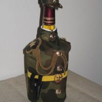 Camouflage tunic on a glass bottle