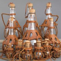 Leather decor of glass bottles