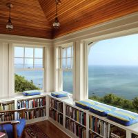 Home library with large windows