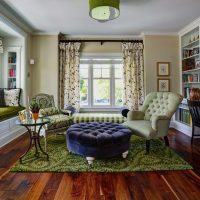 Green carpet on a wooden floor