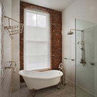 White bath in the bathroom of a private house