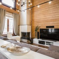 Progettazione di una cucina-soggiorno in una casa in legno