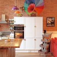 Colored umbrella on the kitchen cabinet