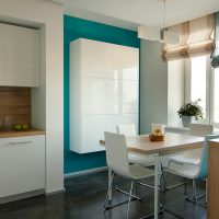 Minimalist white hanging cabinet in the kitchen