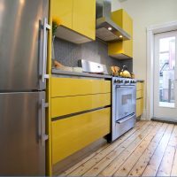 Yellow color in the interior of the kitchen