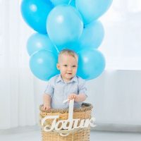 Basket with balloons for a one year old boy