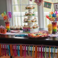 Pyramid of delicious cakes on the dining table