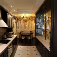 Kitchen with dining area near the window.