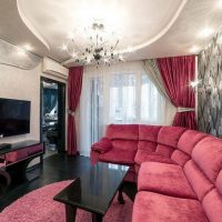 Sofa with velvet upholstery in the living room of a city apartment