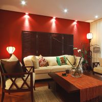 Highlighting a red wall with ceiling lights