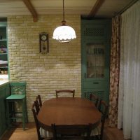 Decorative stone on the wall of a panel house kitchen