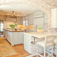 Brick arch between the kitchen and the living room