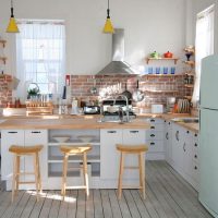 Brick apron in a kitchen with white walls